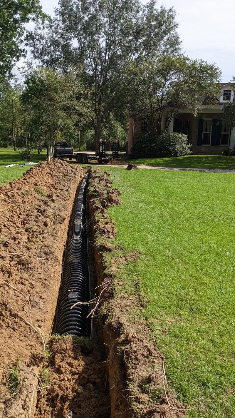 A run of drainfield chambers laid in an open trench.